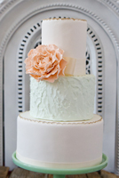 Subtle colour change and mixed textures accented with sugar peony