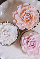 Pastel rose top sugar flower cupcakes.